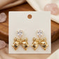 Bow ear rings